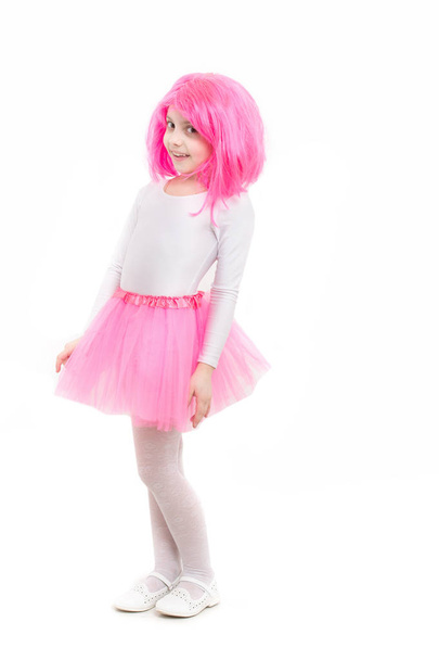 ballet and art. Child in wig isolated on white background. beauty and fashion. Childhood and happiness. Small girl t in pink skirt. - Φωτογραφία, εικόνα