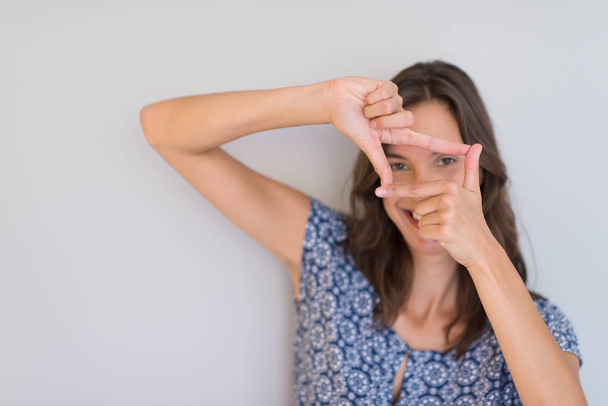 woman showing framing hand gesture - Fotó, kép