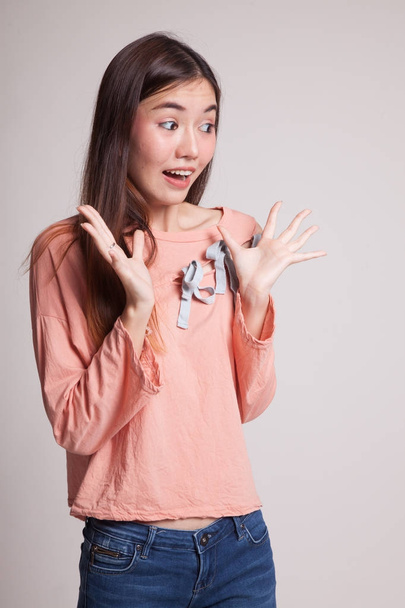 Young Asian woman is surprised and smile. - 写真・画像