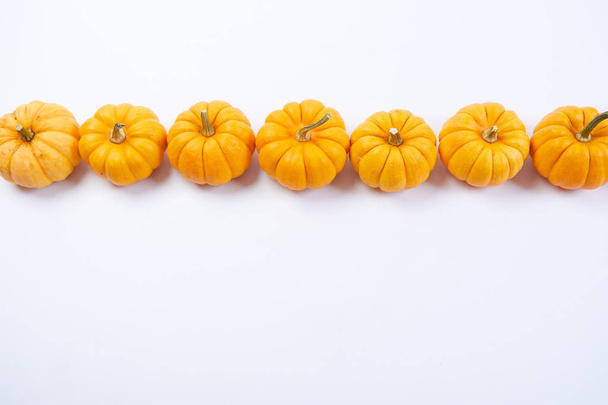 small orange pumpkins - Фото, изображение
