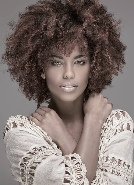 Beautiful woman with afro hairstyle posing. - Zdjęcie, obraz