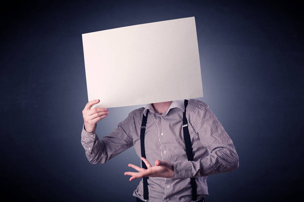 Businessman holding blank paper - Photo, Image