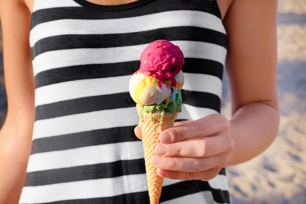  woman holding ice cream - Photo, Image