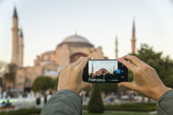 Hands Taking Photo Of Hagia Sophia With Smartphone, Istanbul, Turkey - Foto, Bild
