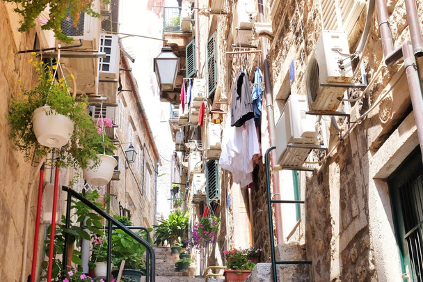 View of picturesque street with old stone steps - Φωτογραφία, εικόνα