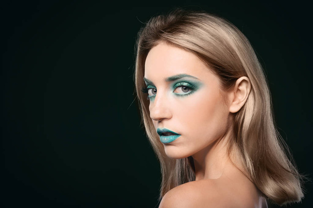 Young woman with bright green makeup  - Foto, immagini