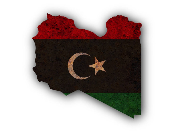 地図と錆びた金属にリビアの国旗 - 写真・画像