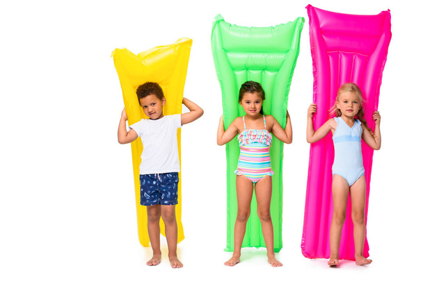 multiethnic kids with swimming mattresses - Photo, Image