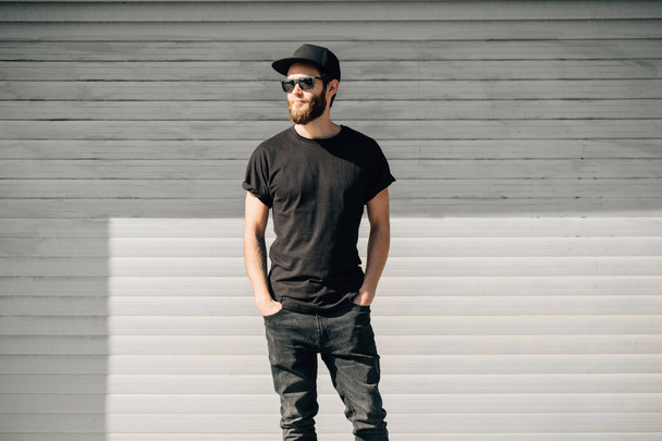 Hipster handsome male model with beard  wearing black blank  t-s - Photo, Image