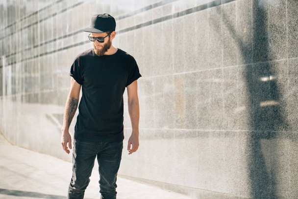 Hipster handsome male model with beard  wearing black blank  t-s - Photo, image