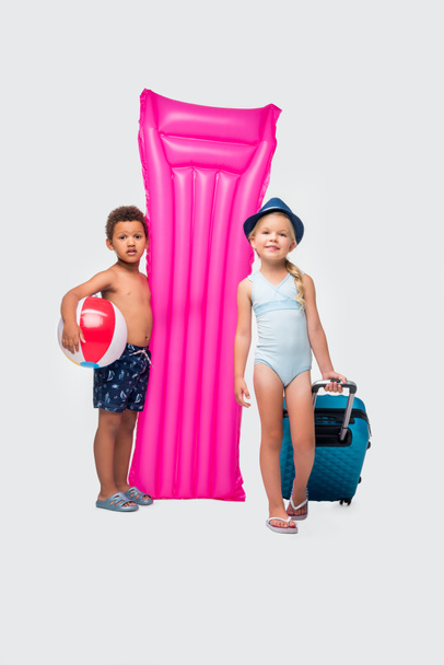 kids with suitcase and swimming mattress - Photo, Image