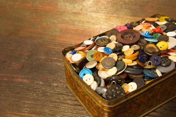 The old buttons. Buttons in an old metal box. - Φωτογραφία, εικόνα