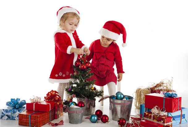 Due felici aiutanti di Babbo Natale
 - Foto, immagini