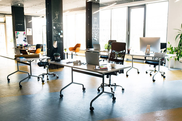 The interior of big bright empty modern office after work. - Fotó, kép