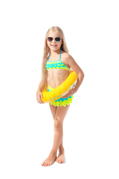 Cute little girl with inflatable donut on white background. Summer vacation concept - Foto, Imagen