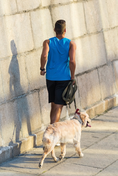sportsman running with dog - Photo, Image