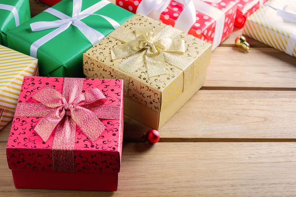 Gift Box Present on a wooden table with Christmas  - Foto, imagen