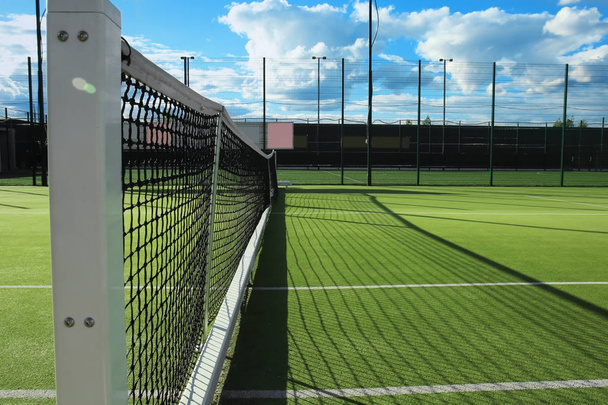 Beautiful tennis court on sunny day - Фото, зображення