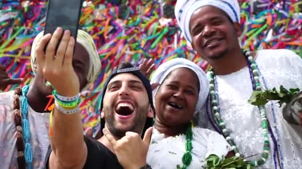 Tourist recording with Candomble group at Bonfim Church in Salvador, Bahia, Brazil - Footage, Video