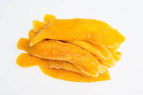 Dried Mango or Dried Mango slices on a background. - Fotografie, Obrázek