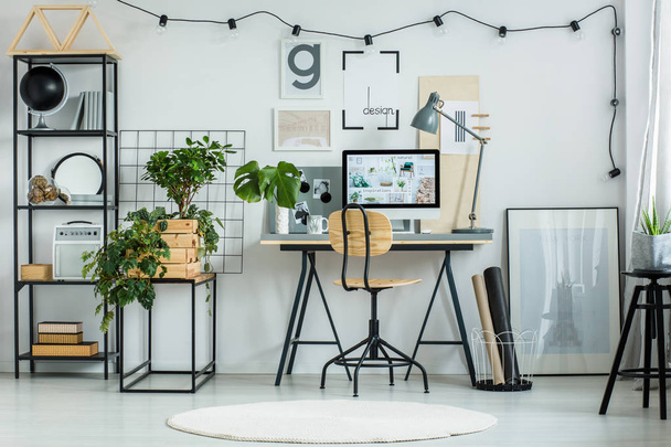 Designer's workspace with classic chair  - Photo, image