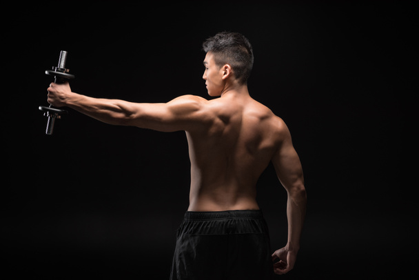 muscular man with dumbbell  - Foto, Imagem