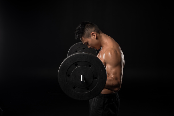 muscular asian man with barbell - Фото, изображение