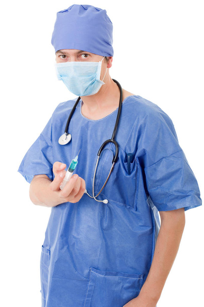 médico con una jeringa aislada sobre fondo blanco
 - Foto, Imagen
