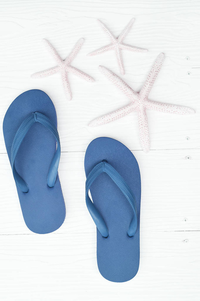 blue sandals and shells  - Zdjęcie, obraz