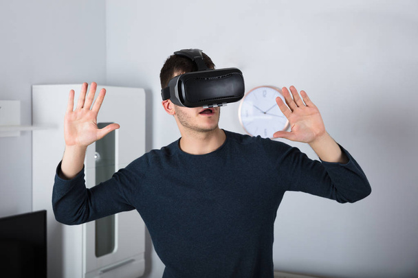 Man Using Virtual Reality - Фото, зображення