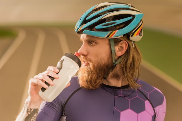 cyclist drinking water - Photo, Image