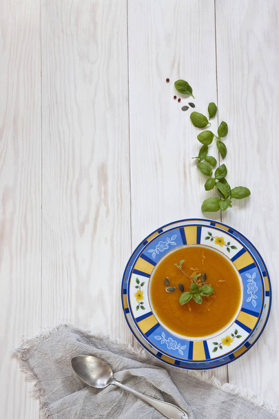 plate with pumpkin cream soup  - Valokuva, kuva