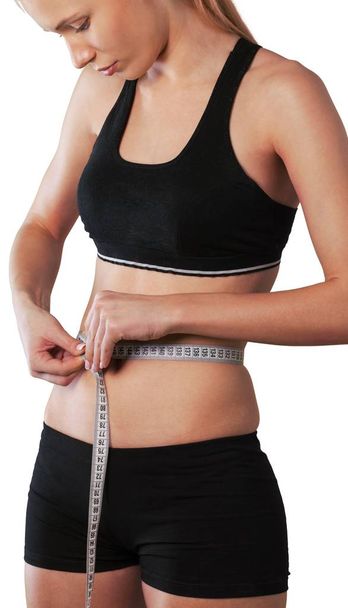 young woman measuring her waist  - Photo, Image