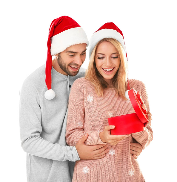 young couple with Christmas present - Foto, imagen