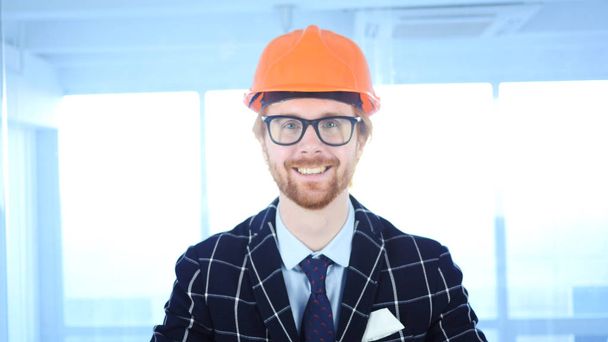 Portrait of Smiling Architectural Engineer with Red Hairs - Photo, Image