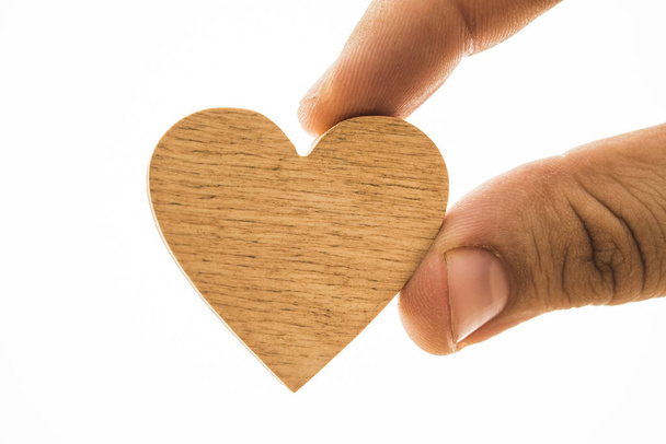 Hand holding  wood heart - Φωτογραφία, εικόνα