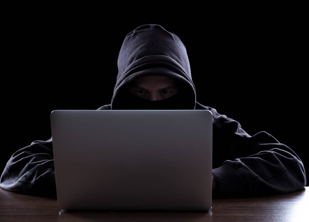 Anonymous hacker in the dark - Fotografie, Obrázek