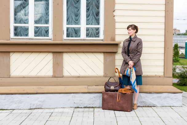 young woman waiting for train at station - Valokuva, kuva