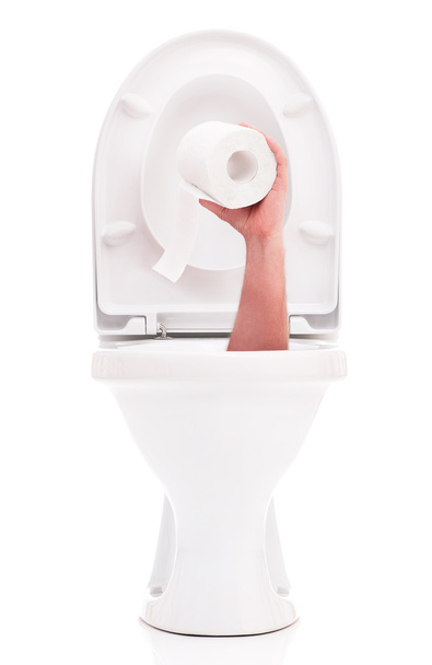 Toilet bowl with hand - Фото, изображение