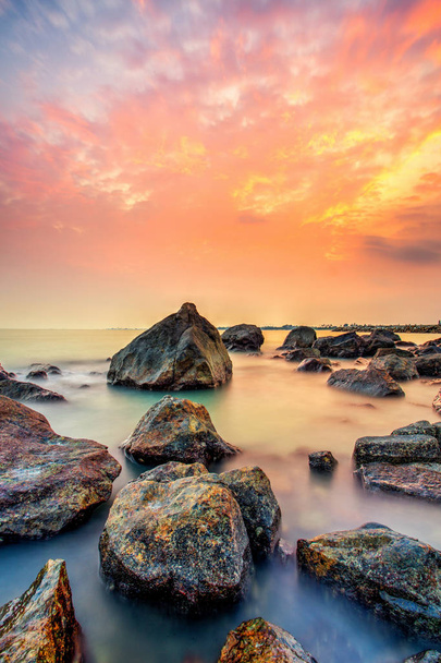 A long exposure picture Beautiful Scenery cloudy Sunset With Sto - Photo, Image