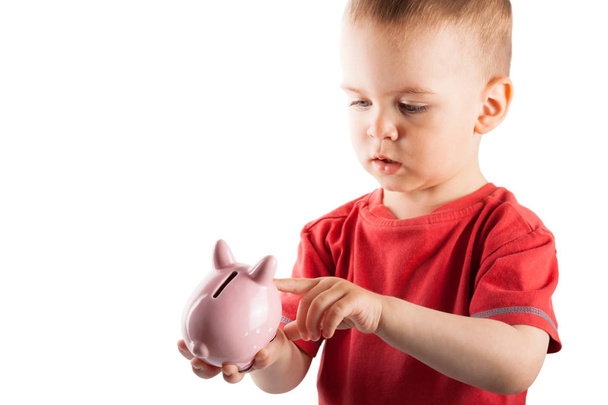 Bambini con scatola di soldi maiale con monete
 - Foto, immagini