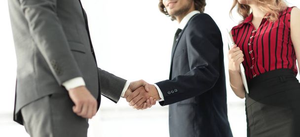 Young businessman shaking hands after agree to collaborate. - Fotó, kép