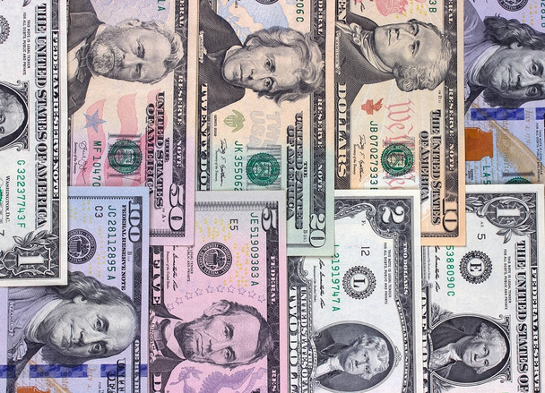 Αφηρημένη Αμερικανών λογαριασμούς δολαρίων από διαφορετική ονομασία υπόβαθρο. - Φωτογραφία, εικόνα