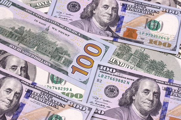 Fondo abstracto de cien dólares billetes nuevos y viejos
. - Foto, Imagen