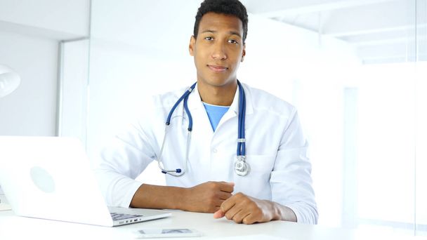 Afro-American Doctor Looking At Camera in Clinic - Photo, Image