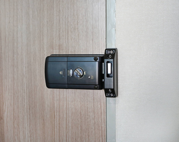 Back side of an electronic door lock room. - Foto, imagen