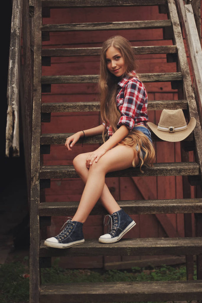 beautiful young cowgirl with long hair - Photo, Image