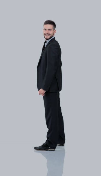 Smiling business man stending in profile - Photo, Image