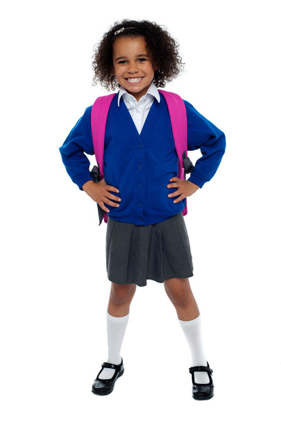 Primary school girl posing confidently - Zdjęcie, obraz