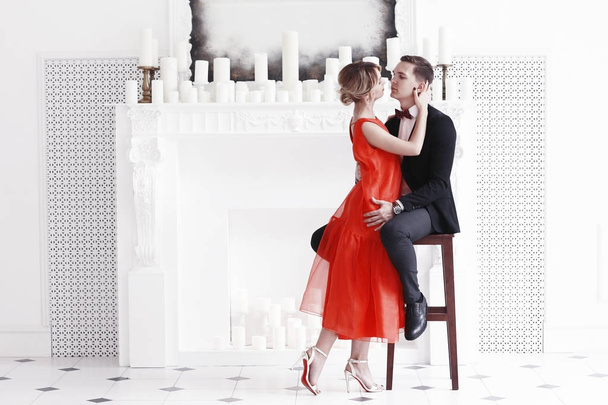 woman and man near fireplace - Zdjęcie, obraz